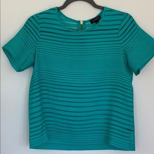 The limited Top. Teal. Size XS